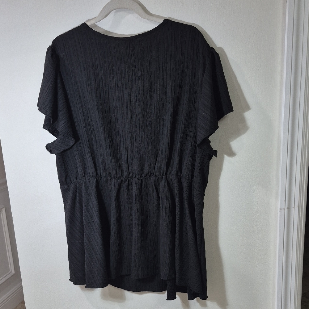 Elegant Black Wrap Blouse - Picture 4 of 10